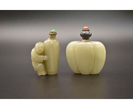 TWO CHINESE CELADON JADE SNUFF BOTTLES, QING DYNASTY, EARLY 19TH CENTURY清 青玉童子持蓮鼻煙壺及 瓜形鼻煙壺 一組The first carved as a boy holdin