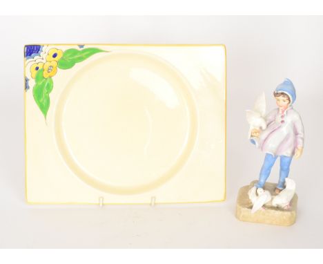 A Royal Worcester model entitled Fantails by Freda Doughty modelled as a young girl feeding doves, black printed mark, height