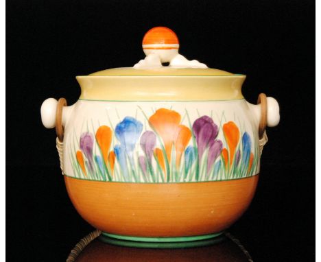 A Clarice Cliff Crocus pattern shape 335 biscuit barrel circa 1952, hand painted with Crocus sprays within yellow, green and 