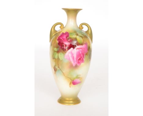 An early 20th Century Royal Worcester twin handled vase decorated with a pink and crimson rose against a pale ground, green p