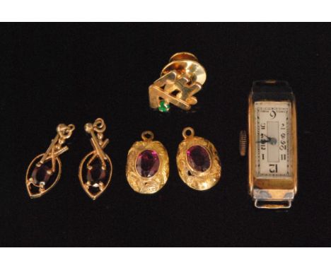 An early 20th Century 9ct hallmarked ladies wrist watch movement marked A. LeCoultre, together with two pairs of earrings and