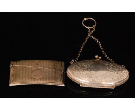 A George V hallmarked silver engine turned card case of hinged clapper board design, Birmingham 1914, together with a white m