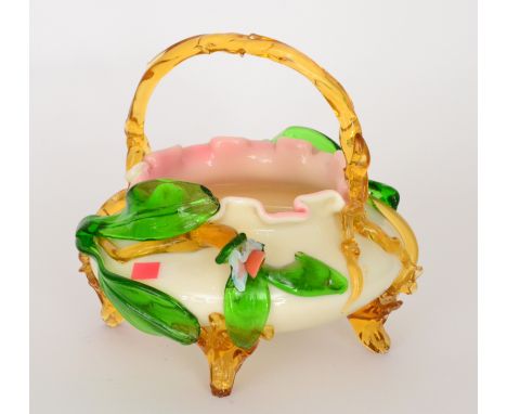 A late 19th Century Stevens & Williams posy basket of compressed ovoid form with frill rim, in opal decorated with applied fl