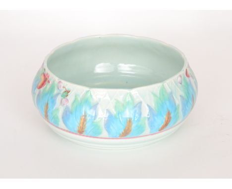 A Clarice Cliff fruit bowl circa 1937 in the Celtic Leaf & Berry pattern, relief moulded with leaves and fruit over a trellis
