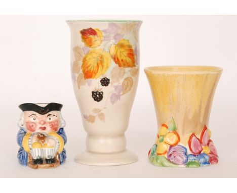 A small Clarice Cliff My Garden vase circa 1934 relief moulded with stylised flowers and foliage picked out in enamel colours