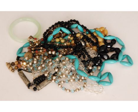 A small parcel lot of costume jewellery items to include a jade bangle, together with various crystal, jet and other bead nec