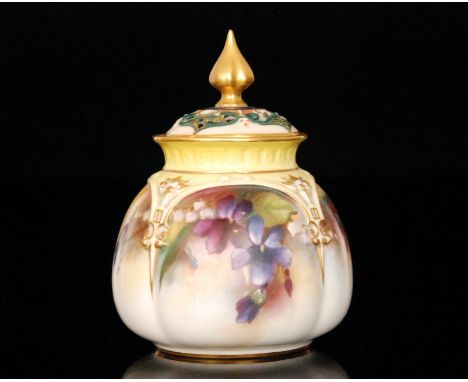 An early 20th Century Royal Worcester Hadley Ware pot pourri and spire cover, the lobed body decorated with violets with moul