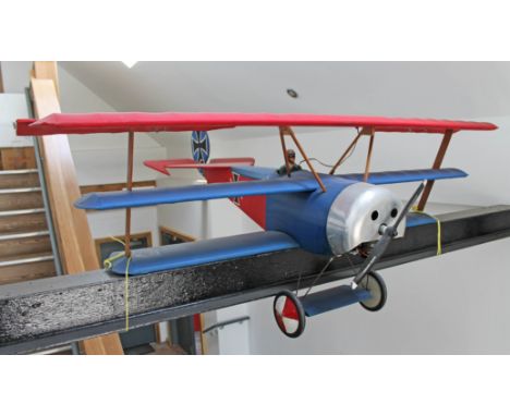A Fokker remote control model Red Baron tri plane with Enya 4 stroke engine, wingspan 186cm.