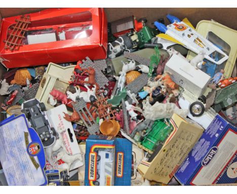 A box of various toys to include plastic and lead animals figures, diecast vehicles and boxed model cars.