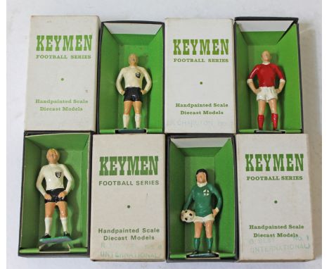 A group of four boxed Keymen Football Series handpainted diecast model footballers. CONDITION REPORT - very good, minor wear 