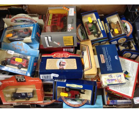 A box of boxed die cast model vehicles