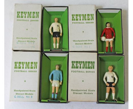 A group of four boxed Keymen Football Series handpainted diecast model footballers. CONDITION REPORT - very good, minor wear 