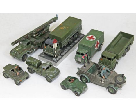 A group of military model vehicles incuding Britains, Dinky and Corgi. CONDITION REPORT - as found...