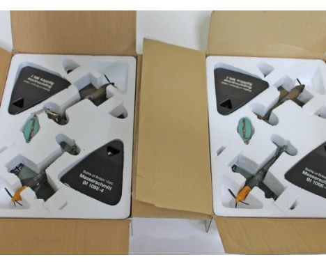A group of 4 boxed model Battle of Britain aeroplanes.