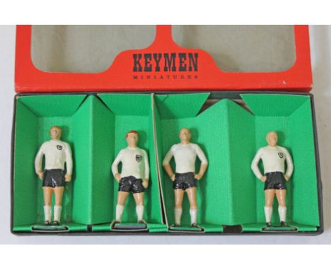 A boxed set of four Keymen Football Series handpainted diecast model footballers. CONDITION REPORT - very good, minor wear on