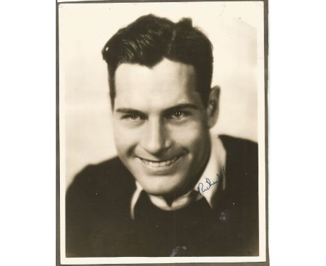 Richard Arlen signed vintage 10 x 8 inch b/w portrait photo fixed to black card, surname in slightly darker area. Condition 6