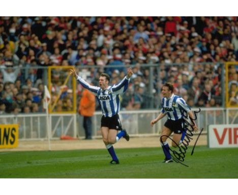 Football Autographed Danny Wilson 12 X 8 Inch Photo Colour, Depicting Wilson Running After His Sheffield Wednesday Team Mate 