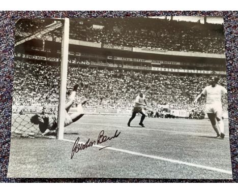 Gordan Banks Famous save England Signed 16 x 12 inch football black and white photo. Good condition. All autographs come with