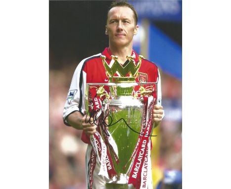 Football Lee Dixon signed 12x8 colour photo pictured with the premier league trophy while playing for Arsenal. Lee Michael Di