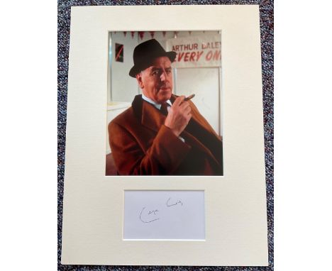 George Cole signature piece mounted below colour Minder photo. Approx size 16x12. 22 April 1925 - 5 August 2015 was an Englis