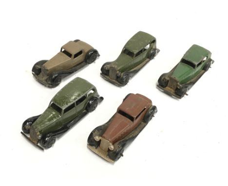 Five Dinky Toys post-war cars, includes 30c Daimler Saloon in green with black chassis and hubs, and 30d Vauxhall in olive gr