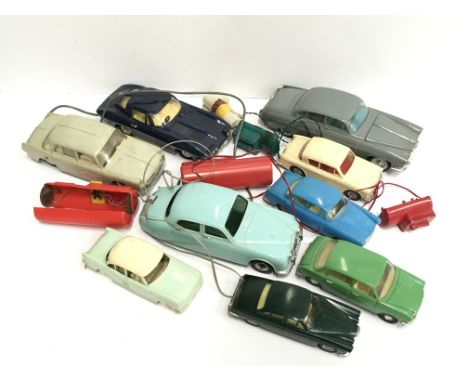 Quantity of plastic cars, includes Marx car with battery operated remote control unit, l.21.5cm and Telsalda battery operated