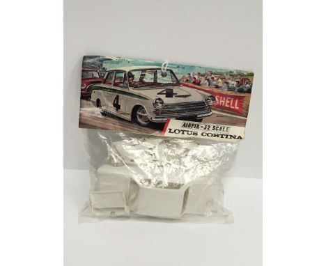 Airfix 1/32 scale Model Car Series Lotus Cortina, first issue white plastic variant. Appears M/ unopened with G/VG illustrate