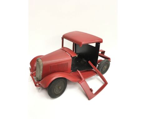 A Citroen metal tractor unit with clockwork motor, appears repainted and metal fragile (one side of cab snapped off but prese