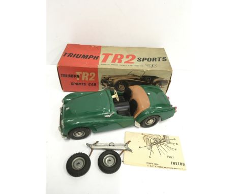 Victory Models (England) Triumph TR2 Sports Car: 1/18 scale plastic model in green, length 21.5cm. Appears G+, missing windsc