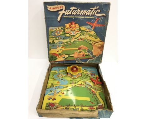 Marx Toys (Gt. Britain) Futurmatic Airport: tinprinted baseplate with airport and tinplate aircraft on wire, clockwork motor 