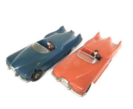 Two Marx Toys (Gt.Britain) futuristic plastic cars: friction drive with windscreen and driver, length 27cm, one red (G, motor