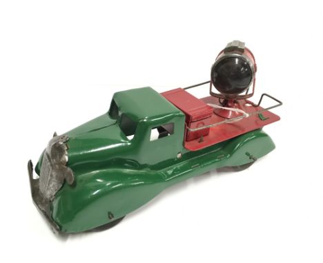 Marx or similar pressed steel Searchlight Truck, with green cab and chassis, red flatbed/ searchlight/ storage crate, plated 