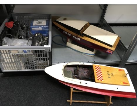 Two model boats: Speedboat EMI (25'') 16; Speedboat Shere Khan (28''). Together with a quantity of engines, transmitters etc.