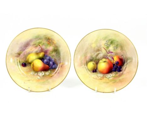 Royal Worcester pair of cabinet plates painted with fruit and signed Ricketts (William Ricketts active 1877 - 1930's), date m