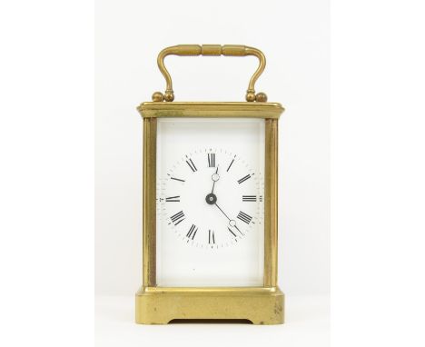 Brass and glass carriage clock, with eight day lever movement, 15cm.    