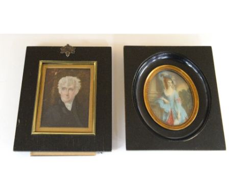 19th century portrait of a man  in a black coat 9cm x 7cm  and another of a lady in a blue dress 8cm x 6cm .    
