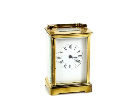 20th century French brass carriage clock with lever movement , 14cm .    