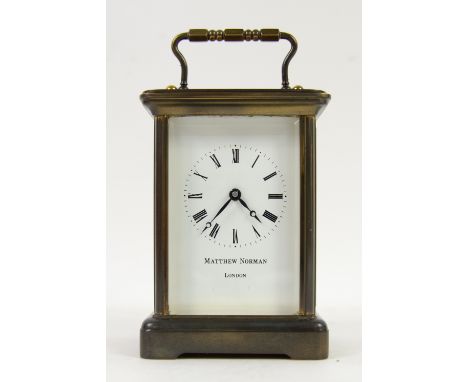 Modern glass and brass carriage clock with lever movement  by Matthew Norman, London, 15cm .    