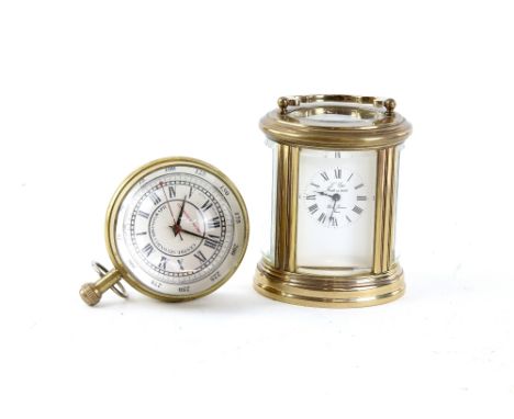 20th century French oval brass carriage clock 11cm  and a  20th century ball clock 7cm .    
