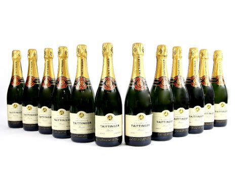 Twelve bottles of Taittinger Brut Champagne, 75cl. In opened box (12).    