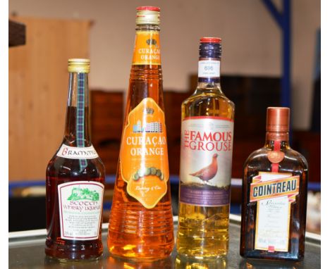 FOUR BOTTLE SPIRIT &amp; LIQUEUR SELECTION COMPRISING FAMOUS GROUSE BLENDED SCOTCH WHISKY, COINTREAU, BRAMMLE SCOTCH WHISKY L