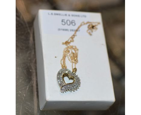 10K GOLD HEART SHAPED PENDANT WITH DIAMOND CHIPS ON 10K CHAIN - APPROXIMATE WEIGHT = 3.3 GRAMS     