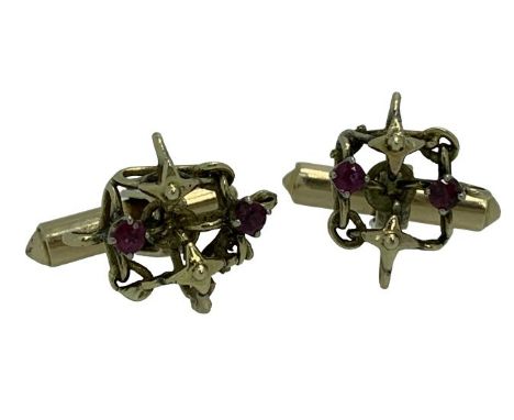 14CT GOLD RUBY SET GENTLEMAN'S CUFFLINKS, A PAIR - the openwork tops with star form detail and two rubies set to each, 6.6grm