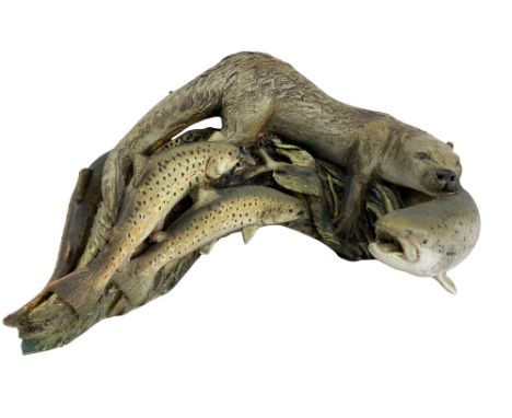 NEIL DALRYMPLE CERAMIC SCULPTURE OF AN OTTER SWIMMING AMONGST TROUT - 7.5cms H, 34cms L, signed and dated 1991