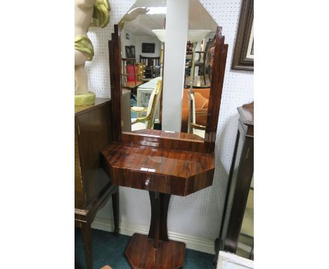 AN ART DECO STYLE ROSEWOOD VENEERED CONSOLE TABLE the raised mirrored back with canted corners within a graduated rectangular