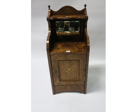 A 19th CENTURY WALNUT AND MARQUETRY INLAID SIDE CABINET the raised back with open shelf decorated with a Classical urn with a