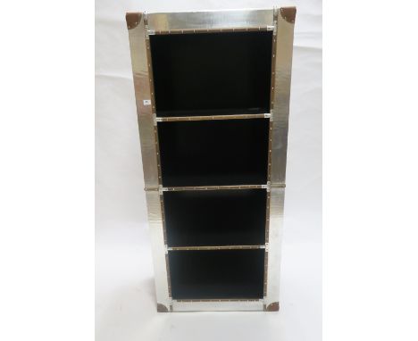 A CHROME AND LEATHER FRAMED OPEN BOOKSHELF in the form of a travelling trunk with four open shelves  181cm x 81cm x 41cm