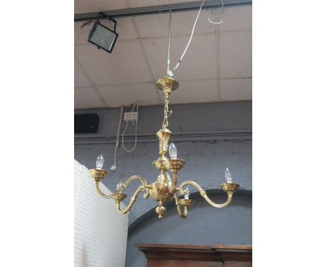 A CONTINENTAL STYLE BRASS FRAMED FIVE ARM CENTRE LIGHT the classical style engraved bowl fitted with five scrolled arms with 