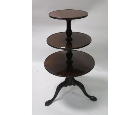 A 19th CENTURY MAHOGANY THREE TIER CIRCULAR DUMB WAITER on ring turned tapering and spiral fluted support with tripod base an