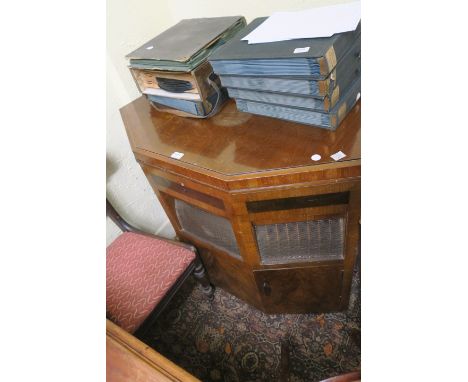 AN EARLY 20th CENTURY WALNUT CASE RECORD PLAYER,94cms x 102cms x 65cms.